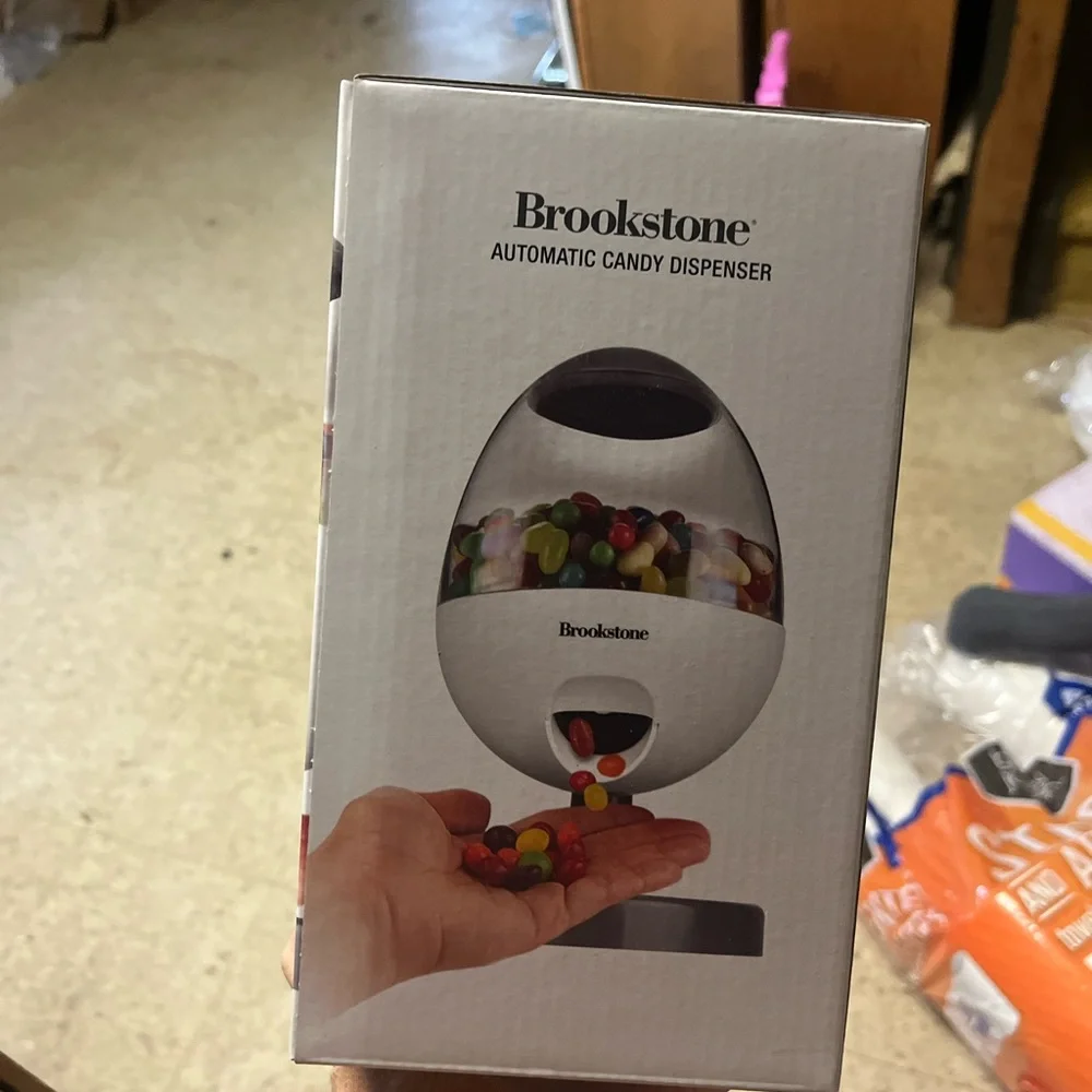 Brookstone White and Clear Automatic Candy Dispenser - Picture 1 of 1